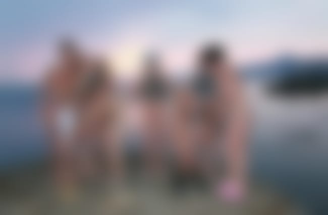 Young nudists on the beach photo [Naked sea]